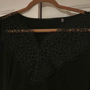 Black dress with lace neckline